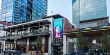 An example of a DOOH ad on location at Fifth and Broadway