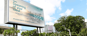 <p>A blank billboard against the backdrop of a blue sky.</p>
